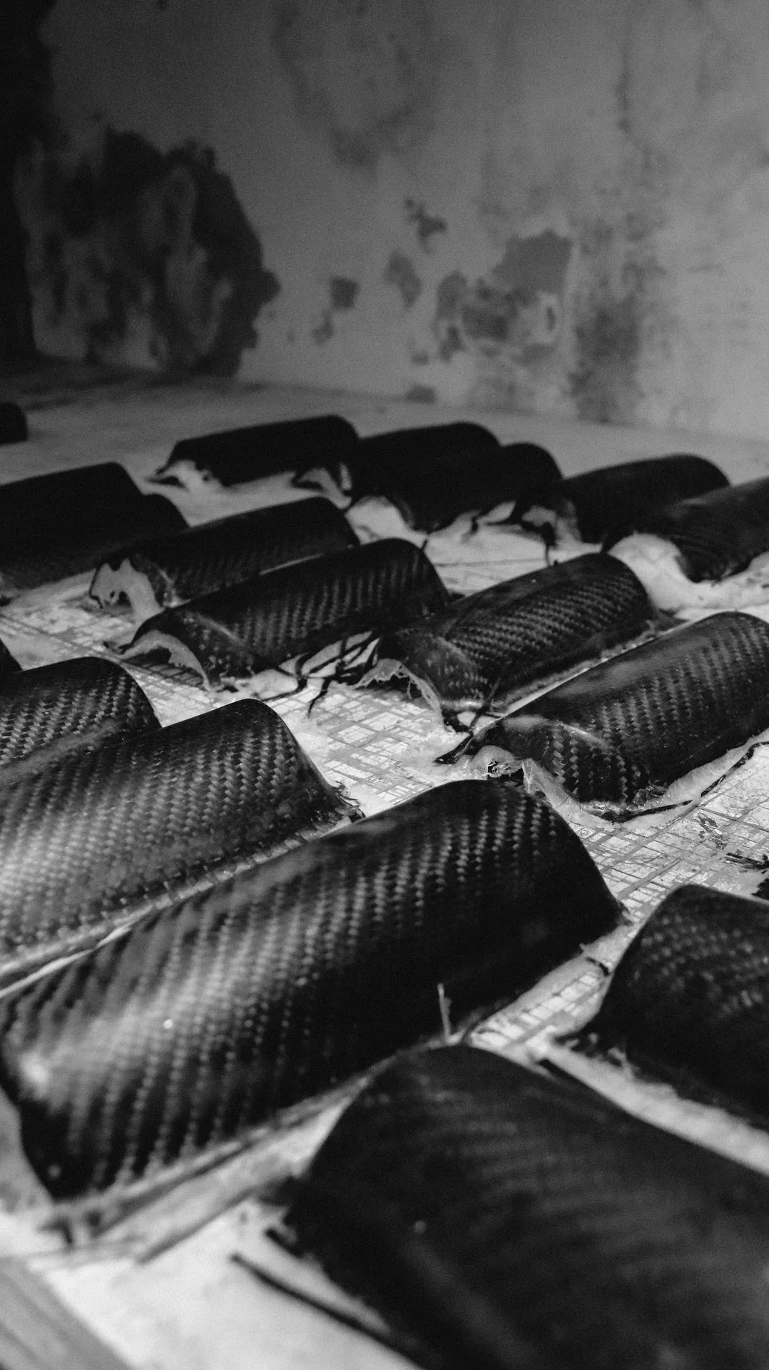 Carbon fibre shin pads in production