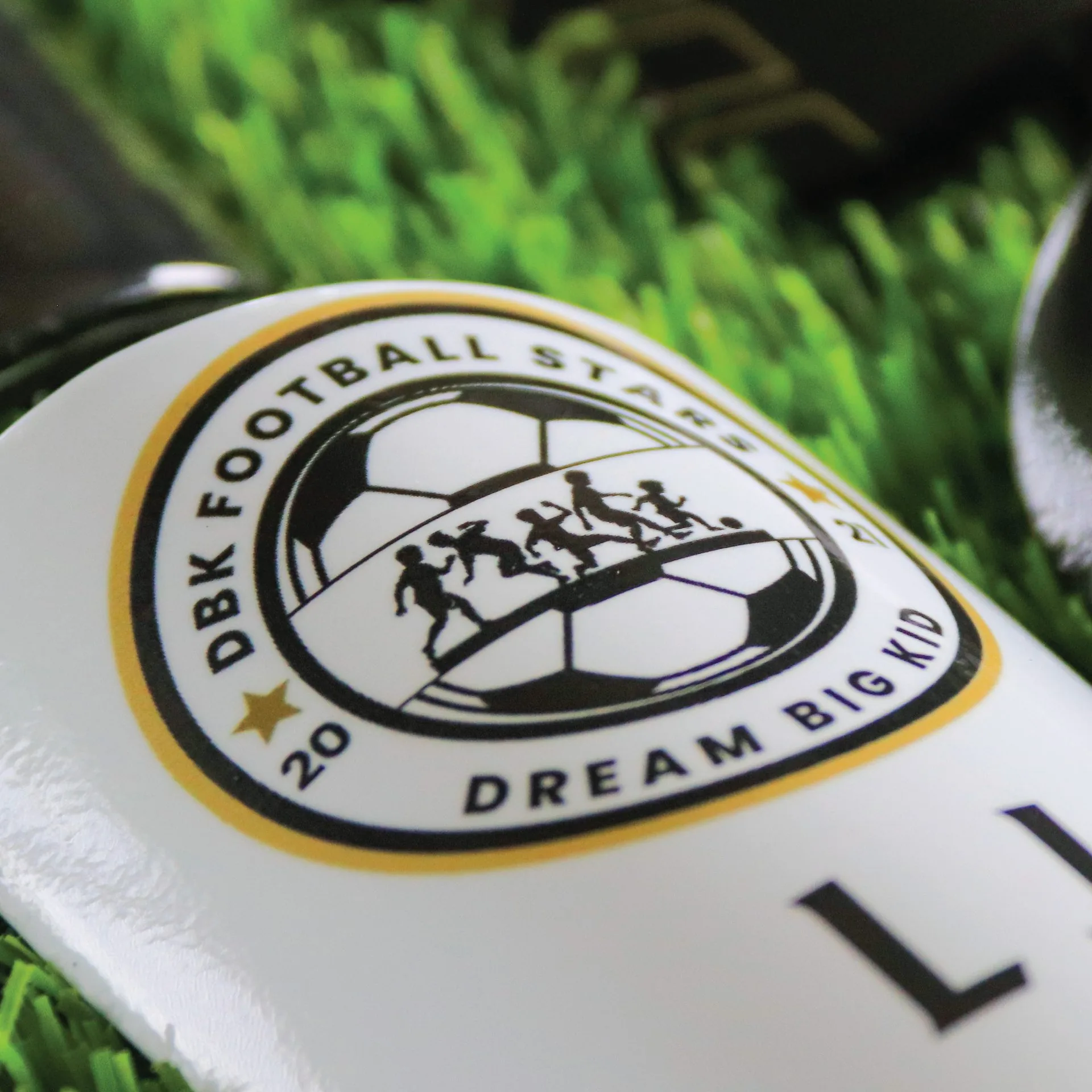 Club badge detail on shin pad