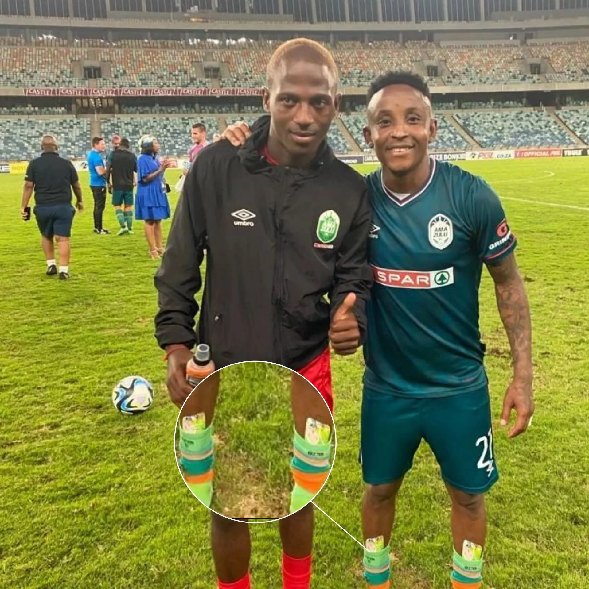 Players on pitch with custom shin pads
