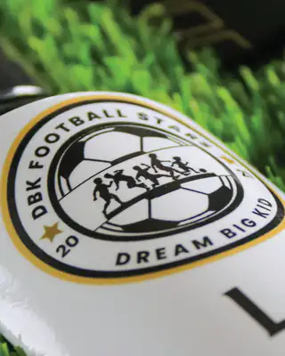 Club badge detail on shin pad