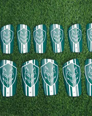 Green wolf club shin pads