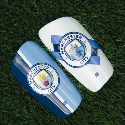 Pair of light and dark blue custom shin pads